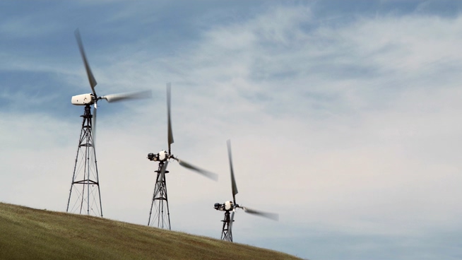 风车快速转动发电促进工业发展的实拍视频